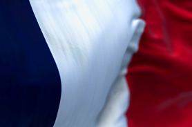 Close-up view of the France national flag waving in the wind